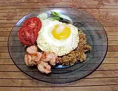 Nasi goreng with shrimp and egg, typical Indonesian breakfast