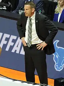 Nate Oats coaching during a 2019 game