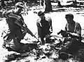 NLA soldiers cleaning their weapons