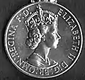 Elizabeth II (1st type); inscription has 'BR OMN' (1952–1958)