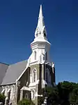 Neo-Gothic church, cruciform, with square tower at entrance and octagonal spire with clock above.
Lancet windows with cusped arches, sometimes in pairs.
Plasterwork spire, plasterwork around doors and windows, and plasterwork buttress detail.
The building replaced a thatched church.
It was built in 1826-31 and enlarged in 1892-94.
James Bisset was the architect of alterations.
Architectural style: Neo-Gothic.
Type of site: Church
Current use: Church.