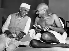 From the late 19th century, and especially after 1920, under the leadership of Mahatma Gandhi (right), the Congress became the principal leader of the Indian independence movement.  Gandhi is shown here with Jawaharlal Nehru, later the first prime minister of India.