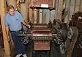 Don Ofe, the Site Administrator of the Neligh Mill, explains how a roller mill from 1888 grinds the wheat into flour.