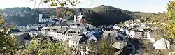 Neuerburg panorama with the parish house, castle and the church