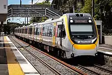 A Queensland Rail Citytrain network train at Yeronga Station in 2018