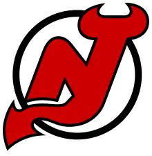 Inside a white circle with black borders, the letters "N" and "J" in red joined together, with the "J" having devil horns at the top and a pointed tail at the bottom.