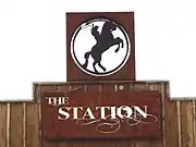 Logo of The Station Stagecoach Stop.