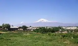 Nor Kyurin (foreground), Marmarashen (background with unfinished church), and Mt. Ararat, May 2009.