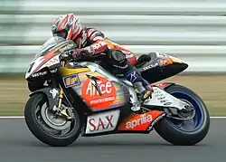 Noriyuki Haga, riding his Aprilia RS Cube in the 2003 Japanese Grand Prix.