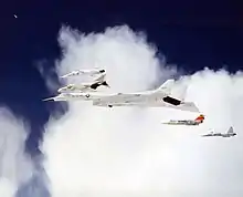 XB-70 Valkyrie flying in formation with an T-38 Talon (far left), F-4 Phantom (near left), F-104 (near right), F-5 Freedom Fighter (far right)