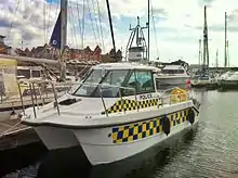 A Cheetah catamaran acquired by the UK's North West Police Underwater Search & Marine Unit in 2012, to be used during the London Olympics