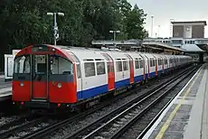 A westbound Piccadilly line train at Northfields, formed of a six-car 1973 stock.