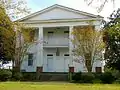 The Oakland Plantation Inn was built in 1829. It was added to the National Register of Historic Places on June 28, 1982.