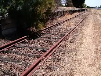 Close up view of the platform (Nov. 2009). By 2012 this track had been dismantled and replaced by a concrete footpath. (May, 2012)