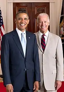 Official portrait of Obama and Biden, smiling