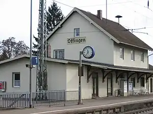 Two-story building with gabled roof