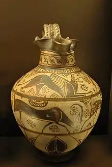 A terracotta trefoil oenochoe