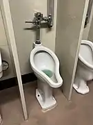 Urinals in a bathroom in the American Museum of Natural History.