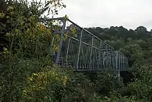 Older-style bridge from the shore.