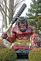 A statue of an oni armed with a kanabō.