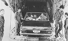 Israeli commandos from the Sayeret Matkal desembarking in Israel after Operation Entebbe in July 1976, with the soldier on the right wearing the first model of the Ephod Combat Vest.