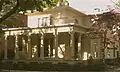 Everard Benjamin House (1838), 232 Bradley St., with Ionic portico.