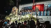 Traditionally at the first fiesta the carossa is decorated with white flowers