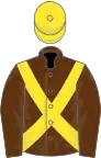 Brown, yellow cross-belts and cap