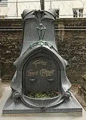 Decorative stylized lettering – Grave of the Caillat Family in Père Lachaise Cemetery, Paris, by Hector Guimard (1899)