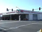 The Firestone building built in 1925 and located at 302 W. Van Buren Avenue. The property was listed in the National Register of Historic Places on October 1, 1985, reference: #85002891.