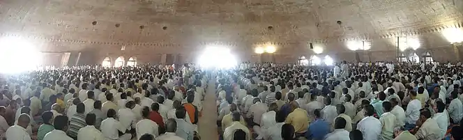 Meditators seated inside the Global Pagoda dome