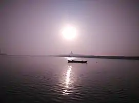 View of the pagoda from Gorai creek at sunset