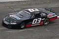 driving her late model at the 2014 Slinger Nationals