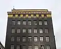 Ideal House in London, a black and gold building