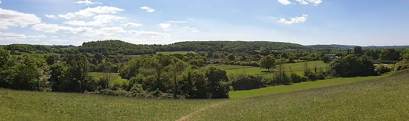 A view of Churchill village taken from Windmill Hill with the edge of the Mendip Hills in the background