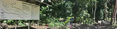 Panoramic photo of Botanical Gardens, Rove Honiara Solomon Islands. Note the hanging spot marked on the sign