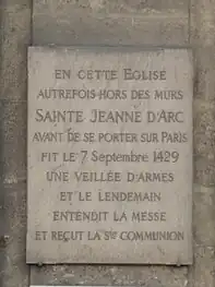 A plaque commemorates the visit of Joan of Arc to the church in 1429