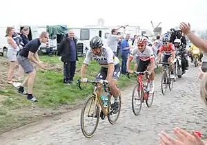 Peter Sagan, Silvan Dillier and Jelle Wallays at the Templeuve-en-Pévèle pavé sector, 35 kilometres (22 miles) from the finish