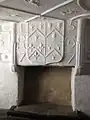 Fireplace in Robert Wynn's bedchamber, showing the Wynn and Griffith quartered arms in the plasterwork