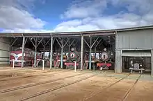 A picture showing part of the Roundhouse where several engines and the Motor Inspection Car reside