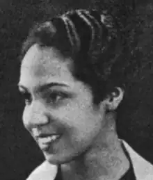 A young African-American woman with wavy hair