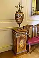 Pedestal and urn (one of a pair), mid 1700s, for use as a plate warmer – State Dining Room – Harewood House