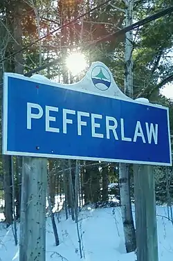 Entrance sign on Pefferlaw Road, north of the community