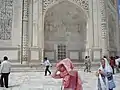 The Quran inscribed on the Taj Mahal with Persian style Calligraphy.