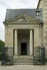 Louis XVI style pediment with a putto of the Théâtre de la reine, part of the Petit Trianon, France, by Richard Mique, c.1780