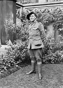 Davey standing at a garden, smiling