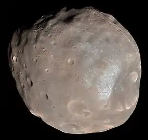 Image 14Phobos (moon)Photo credit: Mars Reconnaissance OrbiterPhobos, the larger and closer of the two moons of Mars, as seen from about 6,000 kilometres (3,700 mi) away. A small, irregularly shaped object, Phobos orbits about 9,377 km (5,827 mi) from the center of Mars, closer to its primary than any other planetary moon. The illuminated part of Phobos seen in the images is about 21 km (13 mi) across. The most prominent feature in the images is the large crater Stickney in the lower right. With a diameter of 9 km (5.6 mi), it is the largest feature on Phobos.More selected pictures