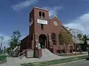 The First Missionary Church was built in 1928 and is located at 902 E. McKinley in Phoenix's historic Garfield neighborhood. The architecture of the structure is that of Mission Revival. It is designated as a landmark by the Historic Preservation-Landmark (HP-L) overlay zoning. It is listed in the Phoenix Historic Property Register.