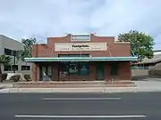 Jim Ong's Market built in 1928 and located at 1110 E. Washington St. The structure, one of two built by the owner in the Chinese Community, also served as the home of the Ong family.  Listed in the National Register of Historic Places, reference: #82002084.