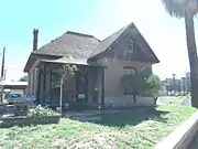 The Louis Emerson House was built in 1904 and is located at 623 N. 4th St. Emerson was a butcher for the "Palace Meat Market". He used to advertise "Meat fit for a king." Designated as a landmark with Historic Preservation-Landmark (HP-L) overlay zoning.  It was listed in the Phoenix Historic Property Register